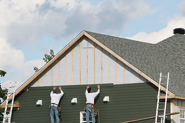 Professional Siding Contractor technician working in West River, MD